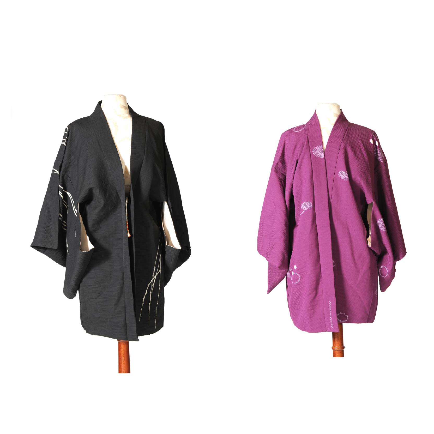 Appraisal: Two Japanese Kimonos the first with black field and decorated