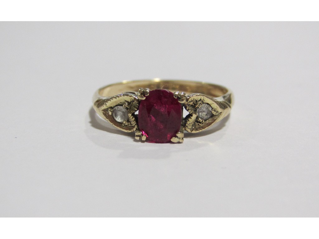 Appraisal: Gold ruby and gem set three stone ring with heart