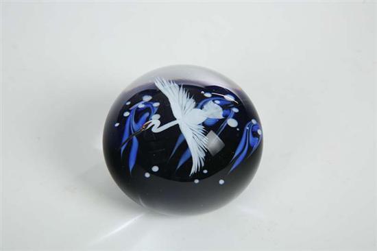 Appraisal: LUNDBERG STUDIOS PAPERWEIGHT Flying white crane over a dark blue