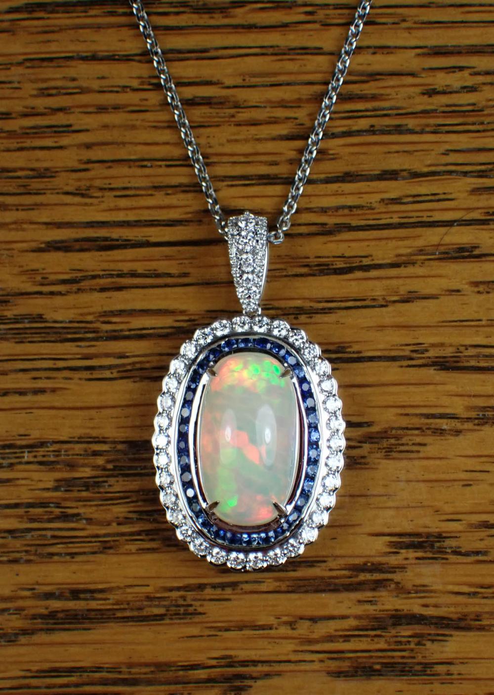 Appraisal: ETHIOPIAN OPAL SAPPHIRE AND DIAMOND PENDANT NECKLACE The k white