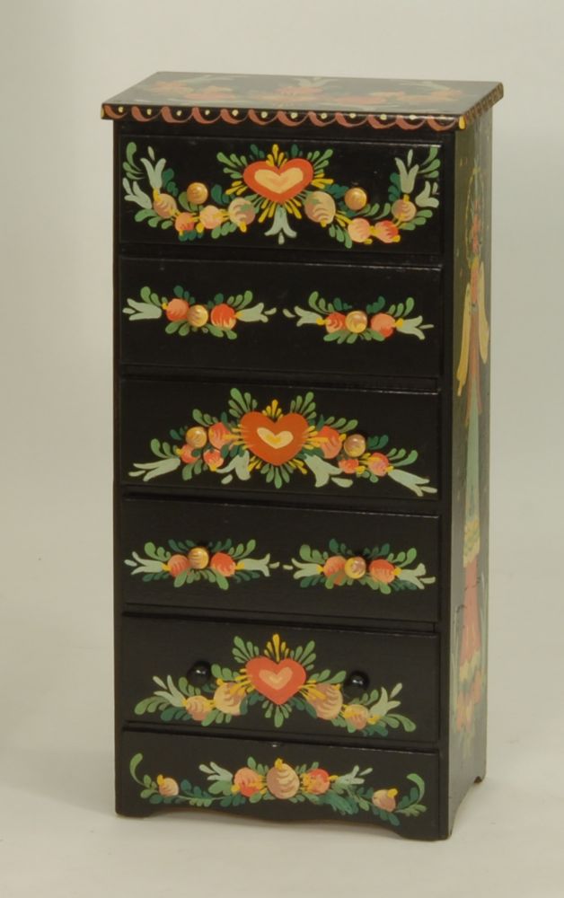 Appraisal: PETER HUNT-DECORATED FIVE-DRAWER CHEST With heart fruit and angel design