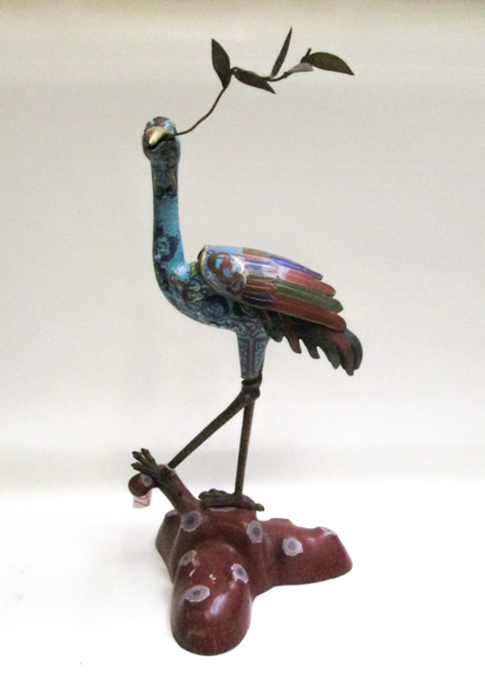 Appraisal: CHINESE CLOISONNE STANDING SCULPTURAL CRANE holding a metal branch with