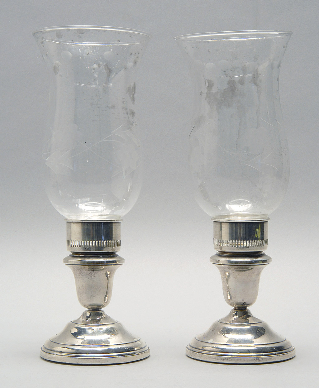 Appraisal: PAIR OF AMERICAN WEIGHTED STERLING SILVER CANDLESTICKS WITH GLASS HURRICANES