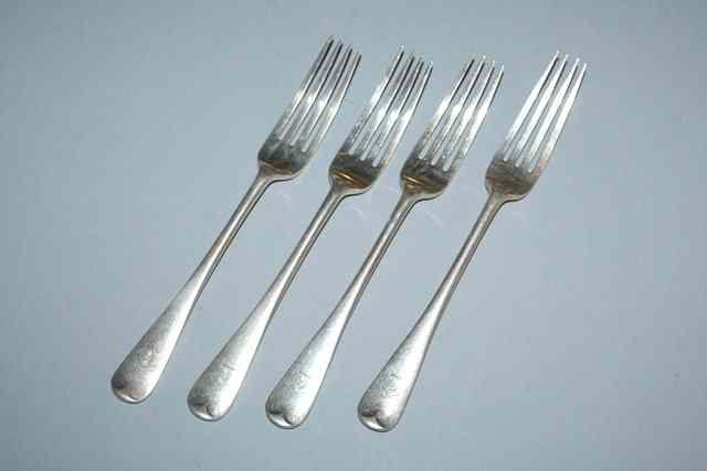 Appraisal: A SET OF FOUR HANOVARIAN PATTERN SILVER TABLE FORKS London