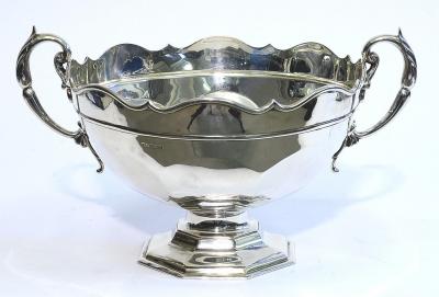 Appraisal: AN EDWARDIAN PUNCH BOWL of panelled circular form with moulded