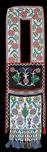 Appraisal: An Ojibwa beaded bandoleer bag Heavily beaded on cloth repeating