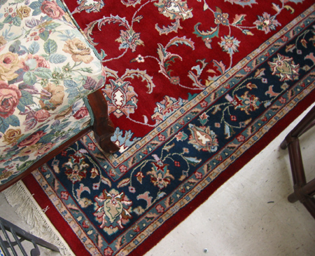 Appraisal: A HAND KNOTTED ORIENTAL CARPET Indo-Kashan overall scrolling floral vine