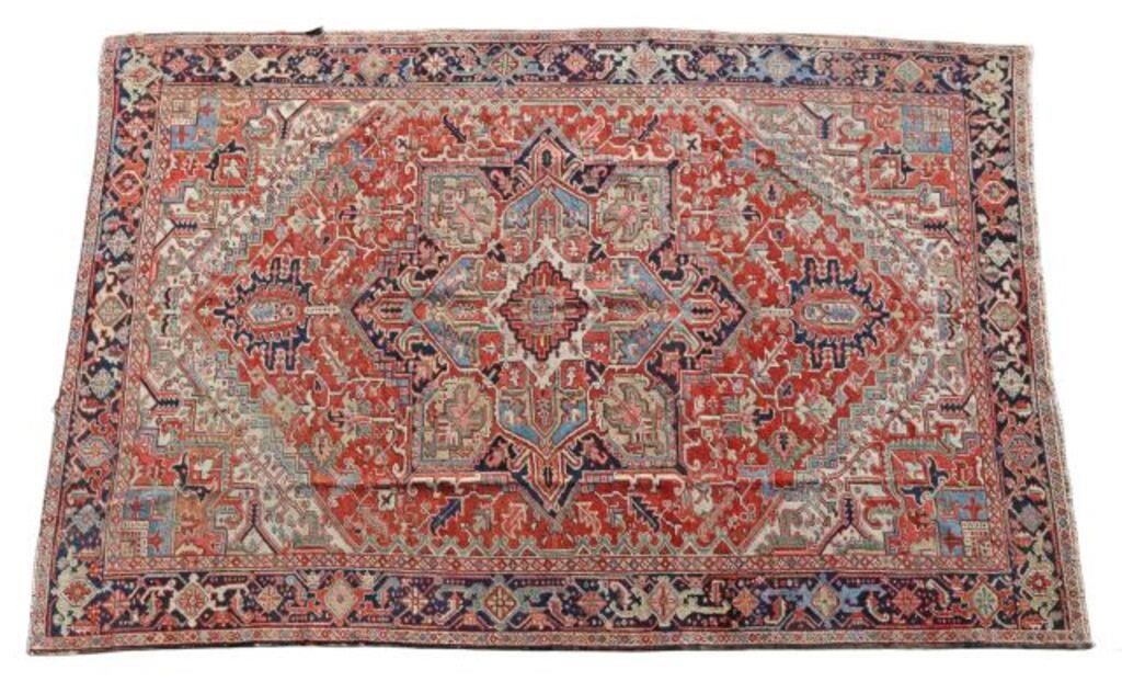 Appraisal: Hand-tied Persian Heriz Serapi wool rug Northwest Iran small tear