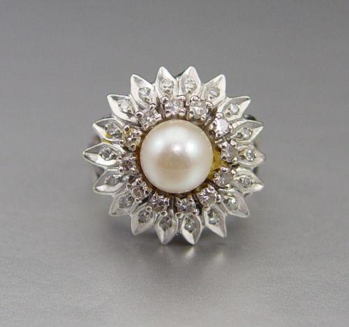 Appraisal: K PEARL DIAMOND RING K white gold ring contains thirty