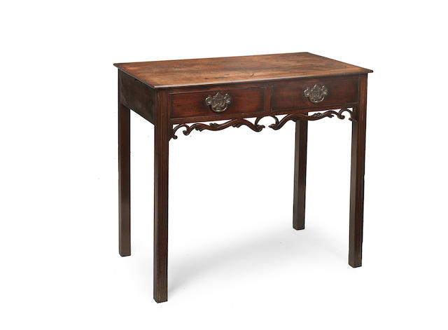 Appraisal: A George III mahogany side table the overhanging rectangular top