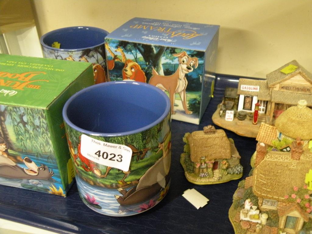 Appraisal: Four Lilliput Lane cottages a Walt Disney Jungle Book mug