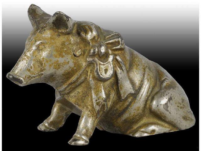 Appraisal: Cast Iron Pig with Bow Still Bank Description Moore book