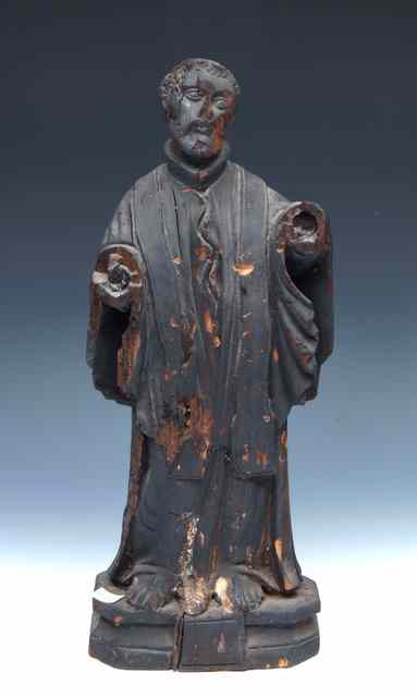 Appraisal: AN ANTIQUE CARVED WOODEN FIGURE of a saint fire damage