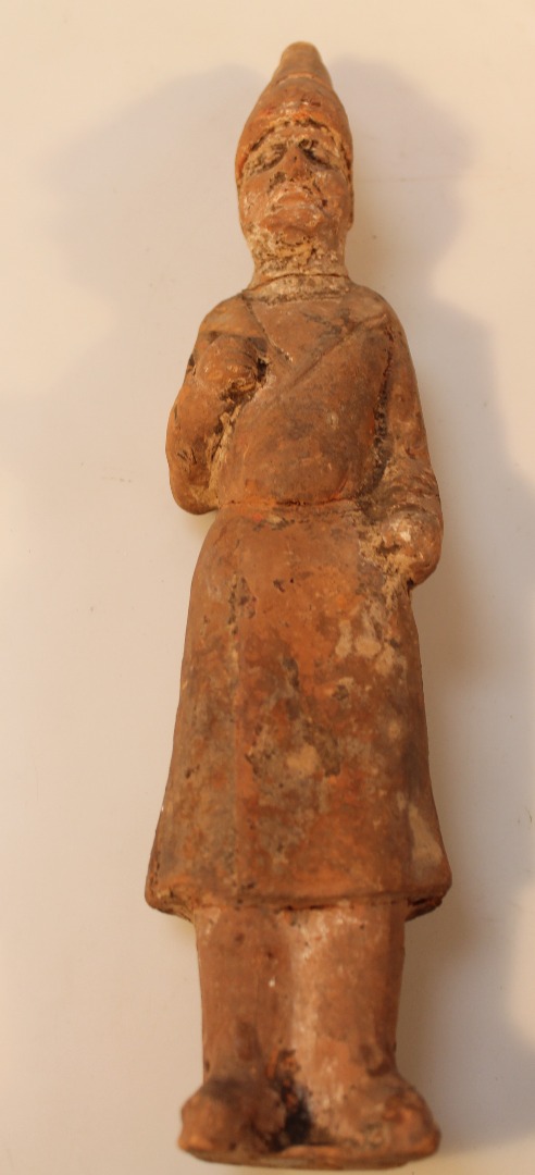 Appraisal: A terracotta grave side figure of a gentleman wearing hi