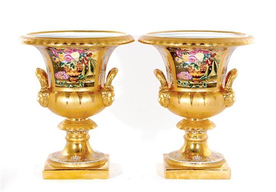 Appraisal: Pair French style porcelain urns flared vasiform on pedestal decorated