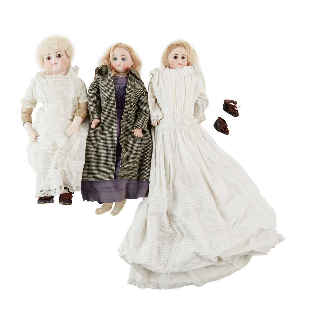 Appraisal: THREE BISQUE DOLLS comprising 'Christina' a bisque shoulder head doll