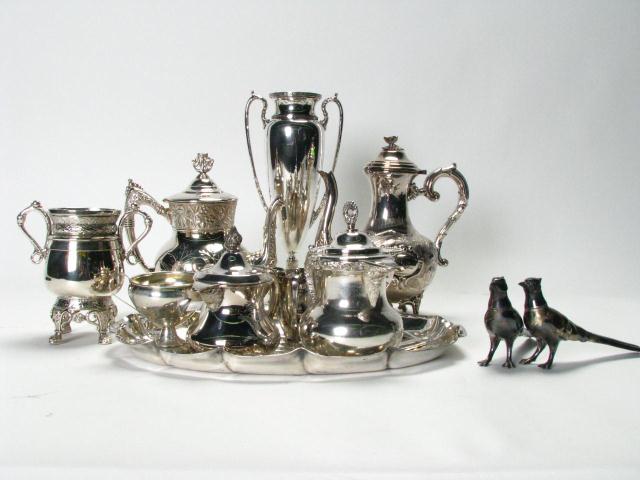 Appraisal: Large group of ornate silverplate including '' handled pedestal vase