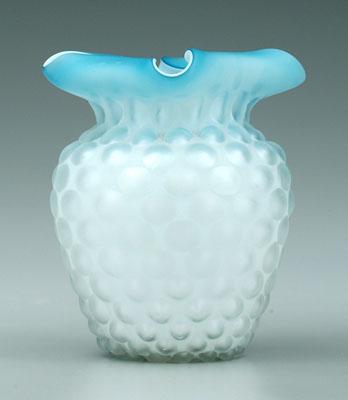 Appraisal: Mother-of-pearl satin glass vase blue folded rim raised raindrop pattern