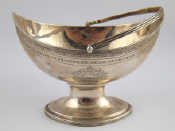 Appraisal: A Georgian silver sugar basket with navette shaped bowl Alexander