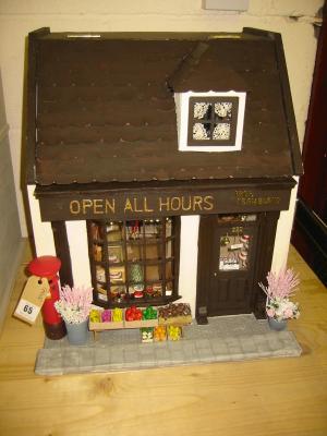 Appraisal: A late th century scratch built doll's shop Open All