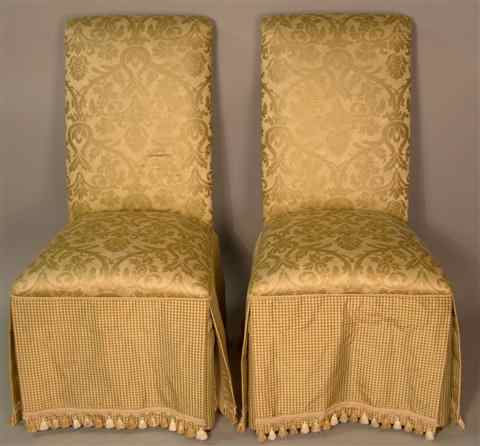 Appraisal: PAIR OF UPHOLSTERED PARSON'S CHAIRS the rolled back above a