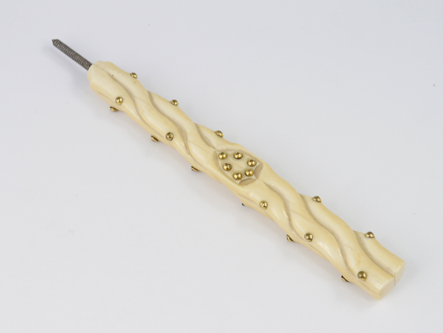 Appraisal: BRASS TACKED AND CARVED IVORY WALKING STICK OR CANE HANDLE