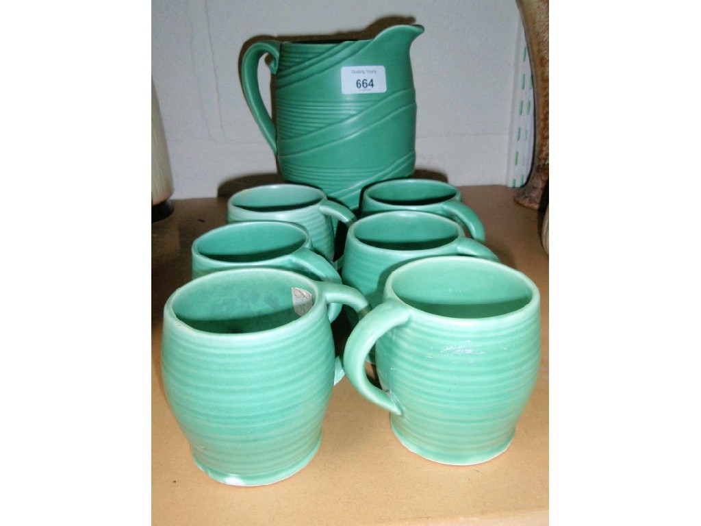 Appraisal: A Sylvac green glazed water set