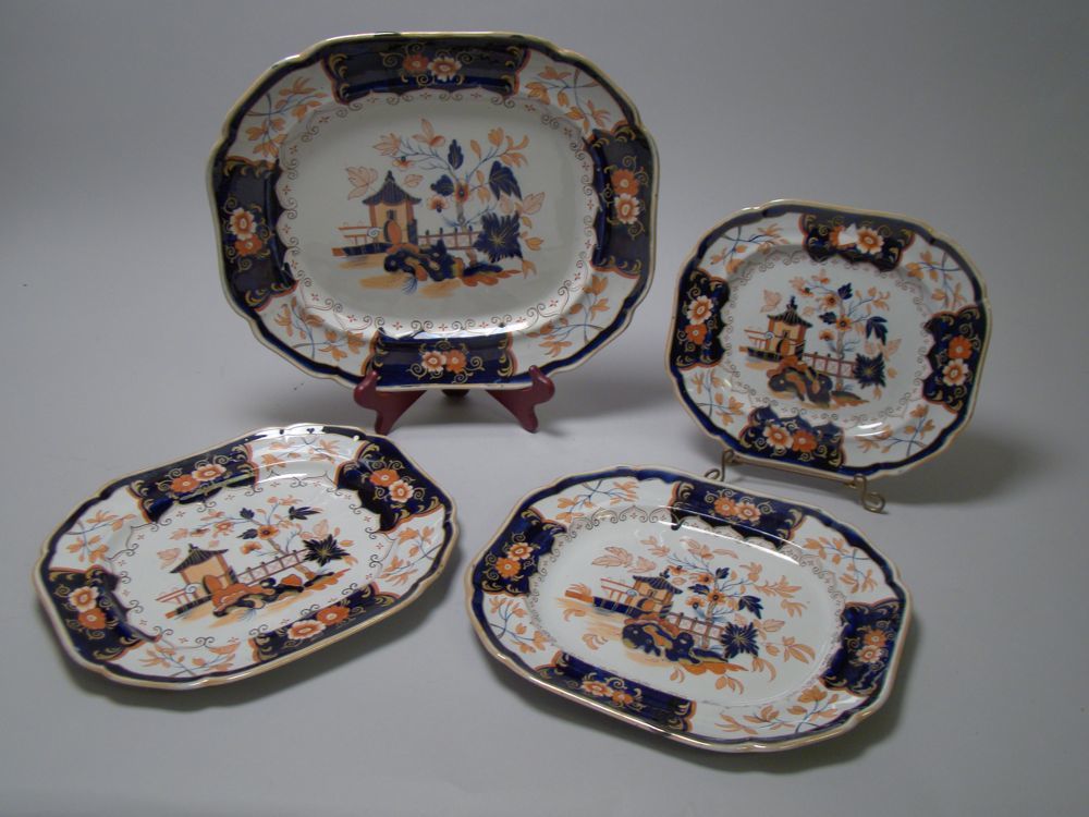 Appraisal: SET OF FOUR IMPERIAL STONE CHINA PLATTERS With gaudy design