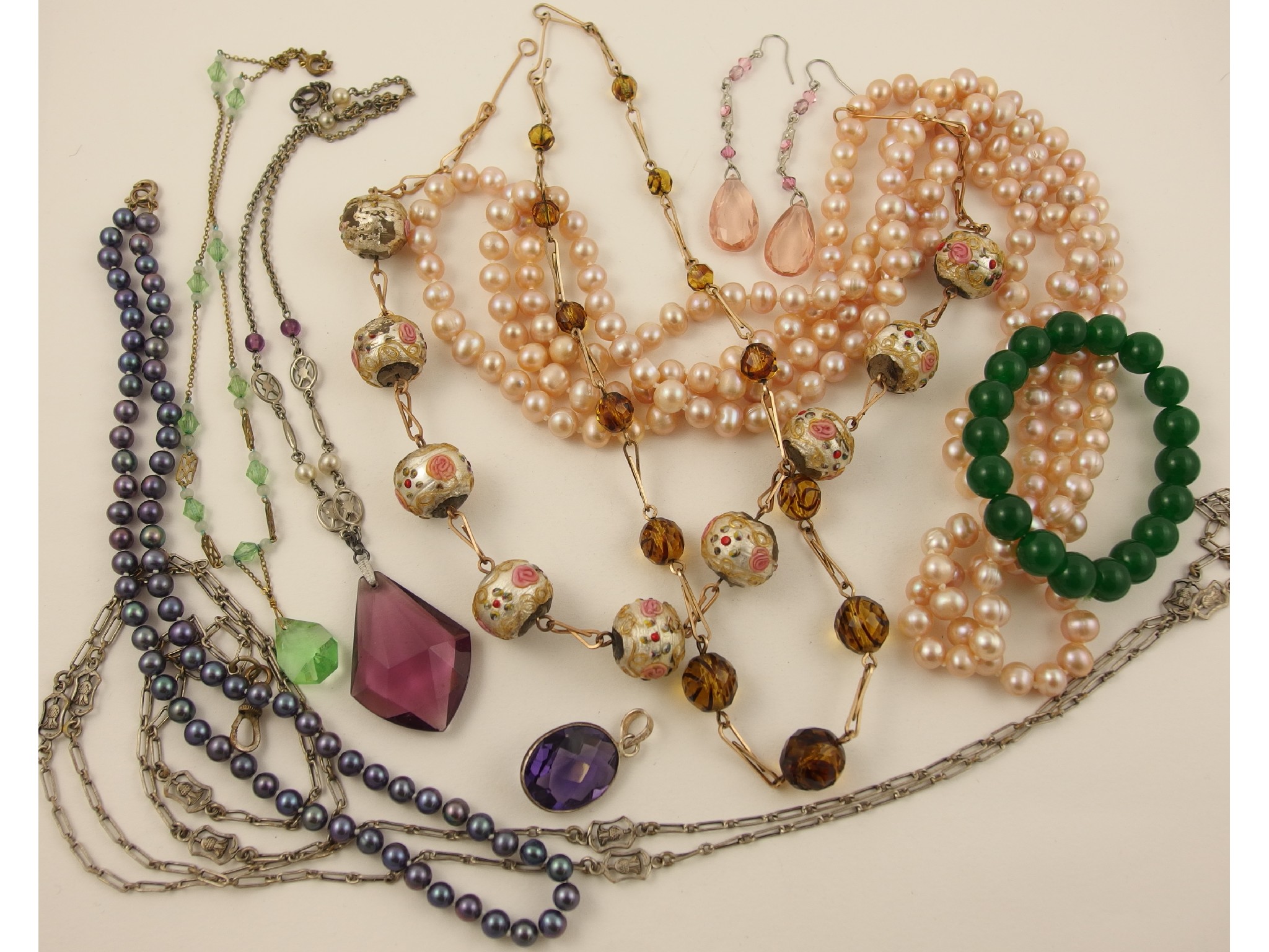 Appraisal: A long string of pink pearls and vintage beads