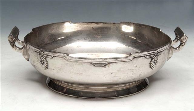 Appraisal: A SILVER ART DECO STYLE TWO HANDLED BOWL with shaped