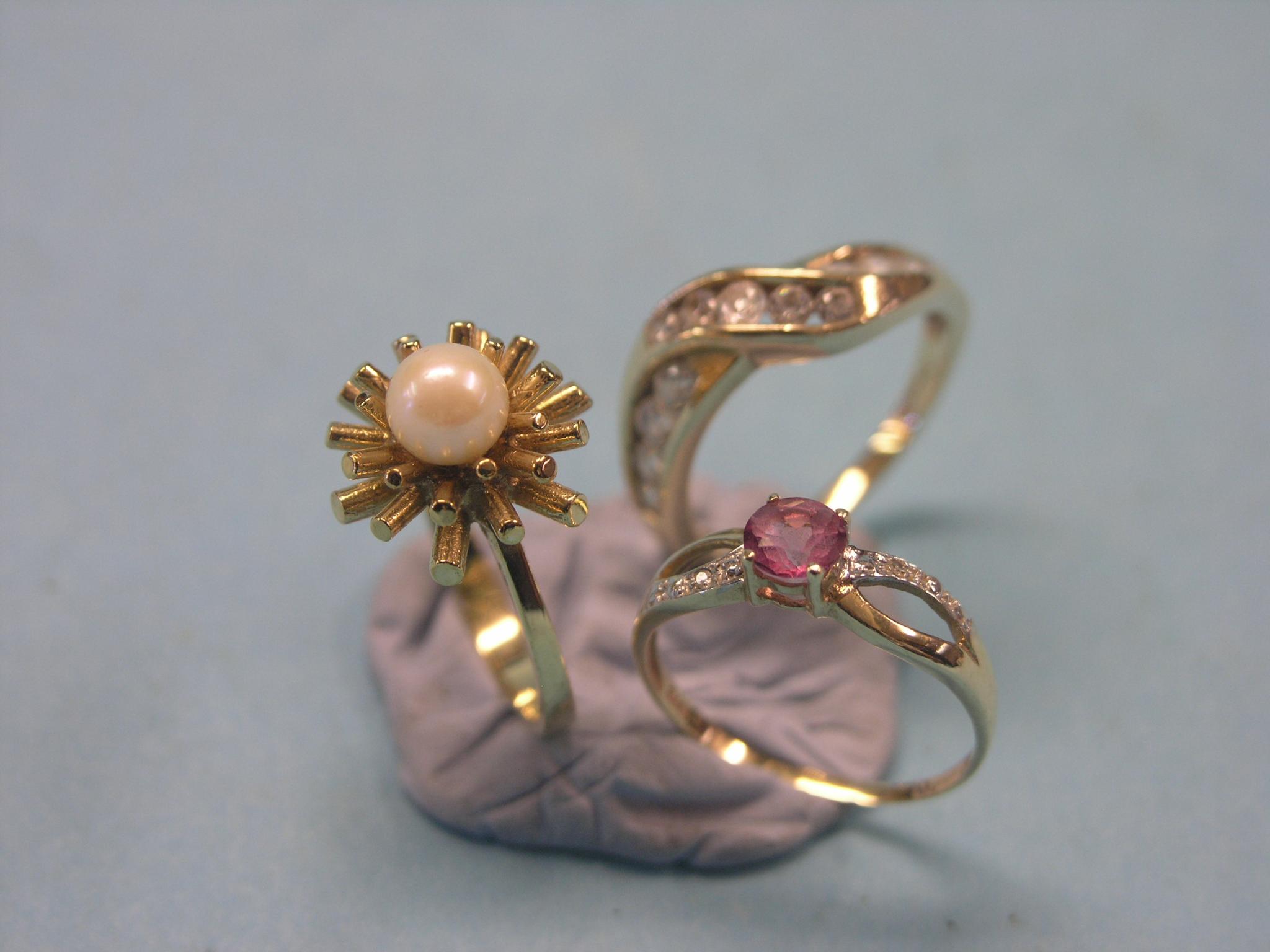 Appraisal: A ct gold ring set single pearl and two other