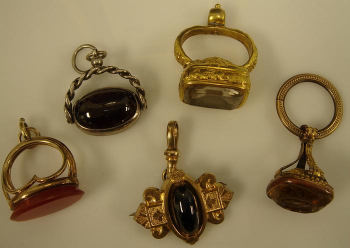 Appraisal: Gold-filled Silver Fob Lot Including four fobs with various stones