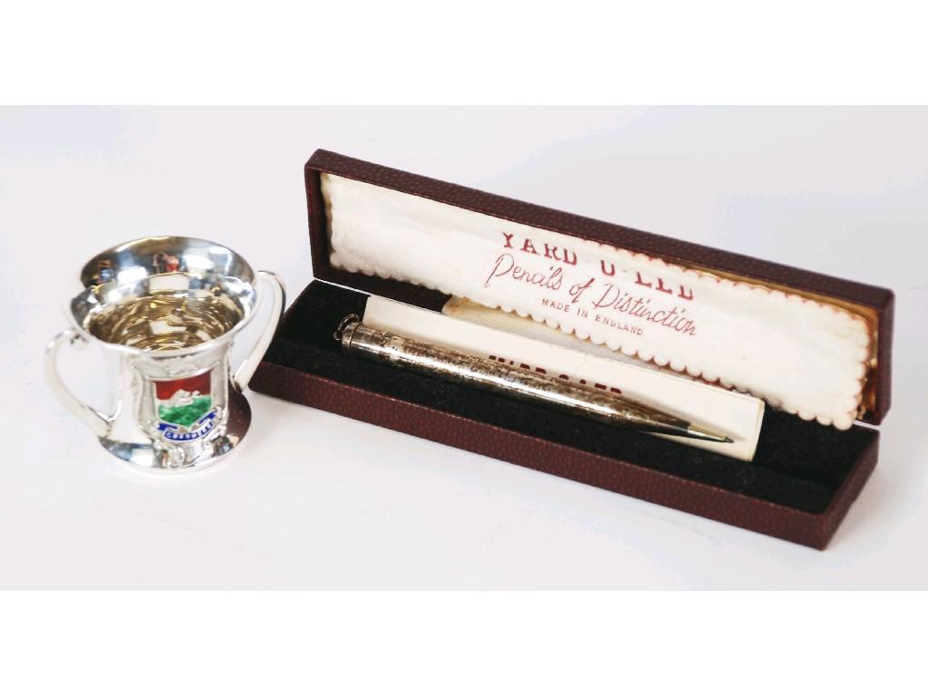 Appraisal: EDWARD VII SILVER AND ENAMELLED MINIATURE TWO HANDLED SOUVENIR LOVING