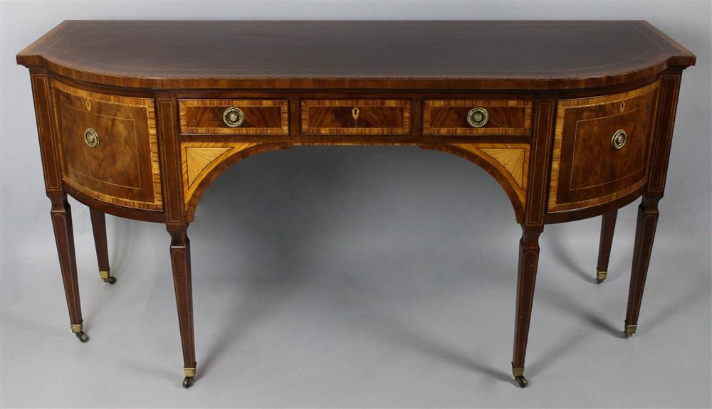 Appraisal: BAKER GEORGIAN STYLE MAHOGANY CROSSBANDED AND INLAID SIDEBOARD having a