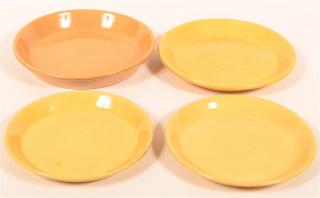 Appraisal: Four Various Yellowware Plates Two measure - diam One -