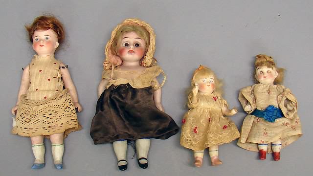 Appraisal: Lot of dolls Wire strung - painted eyes pink boots