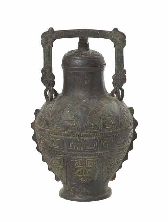 Appraisal: A Chinese Bronze Archaistic Style Baluster Vase having geometric decoration