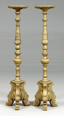 Appraisal: Pair carved wood torcheres each with gold surface over red