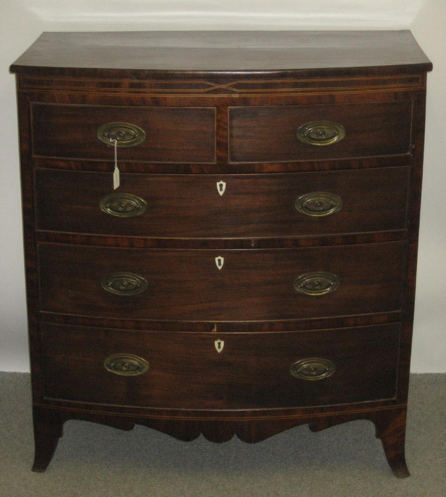 Appraisal: A GEORGE III MAHOGANY CHEST early th century of bowed