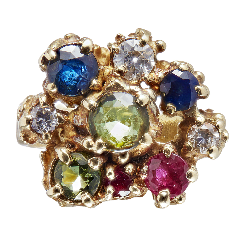 Appraisal: A contemporary multi-gem set cluster ring claw set with graduated