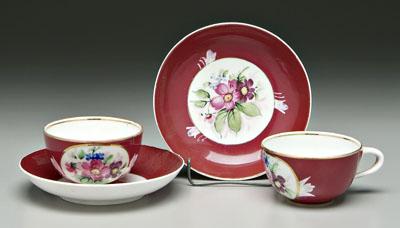 Appraisal: Gardner Russian cups and saucers hand painted floral bouquets on