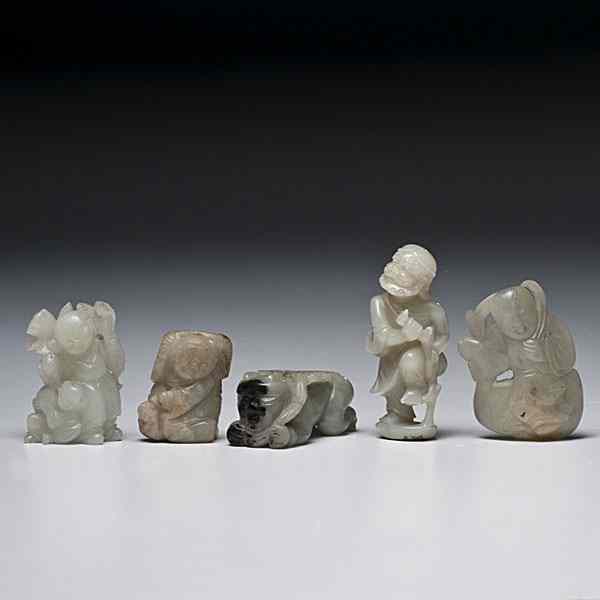 Appraisal: Chinese Jade Figural Carvings Chinese early th century A group