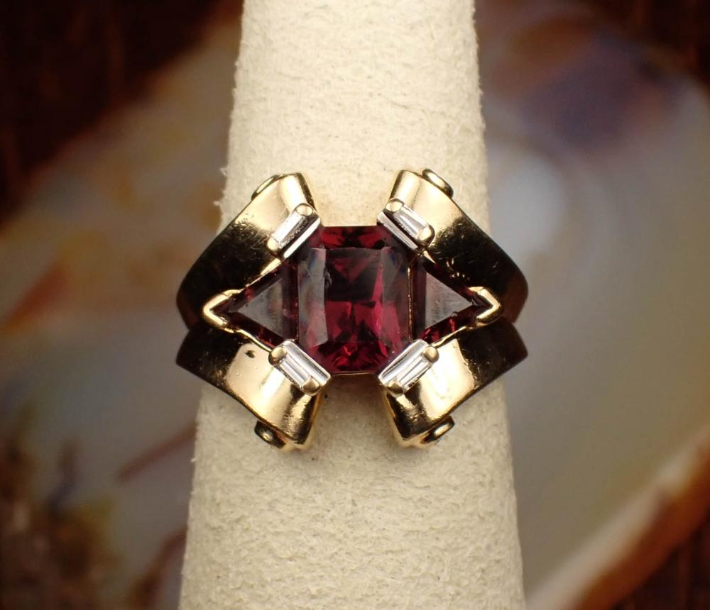 Appraisal: GARNET DIAMOND AND FOURTEEN KARAT GOLD RING The yellow gold