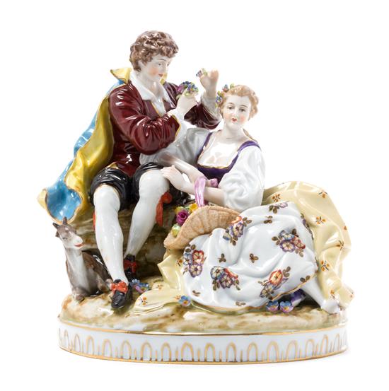 Appraisal: Sale Lot A Continental Porcelain Figural Group depicting a gentleman