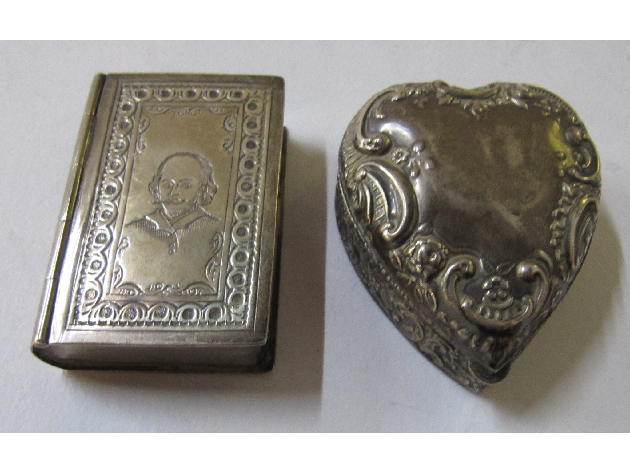 Appraisal: A lot comprising a silver heart shaped pill box Birmingham