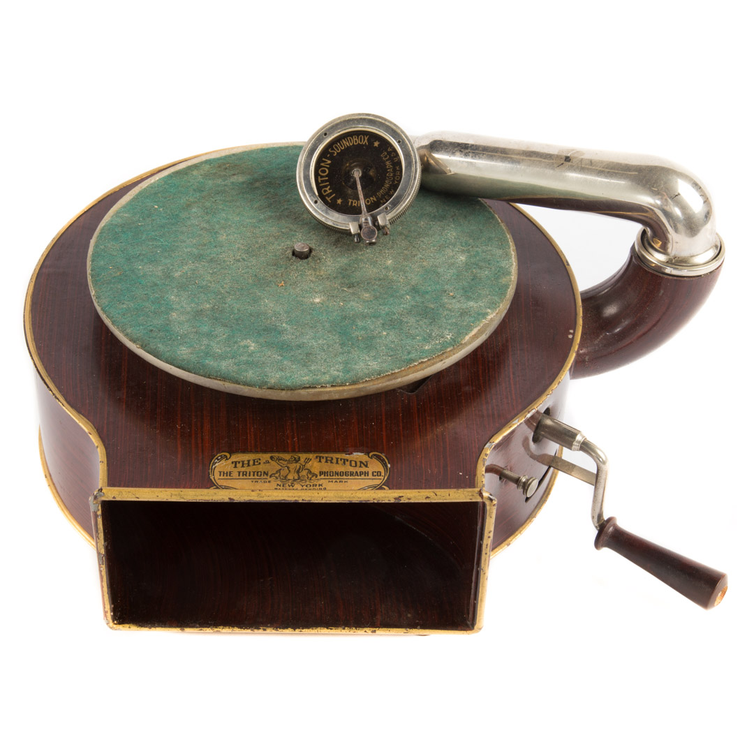 Appraisal: Triton enameled metal portable phonograph circa s shaped case with