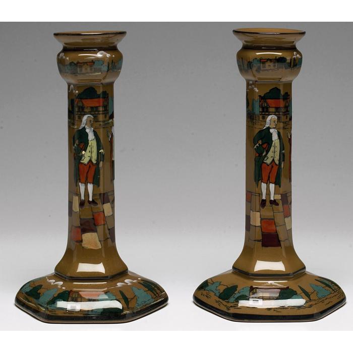 Appraisal: Buffalo Pottery Deldare Ware candlesticks pair village scene one signed