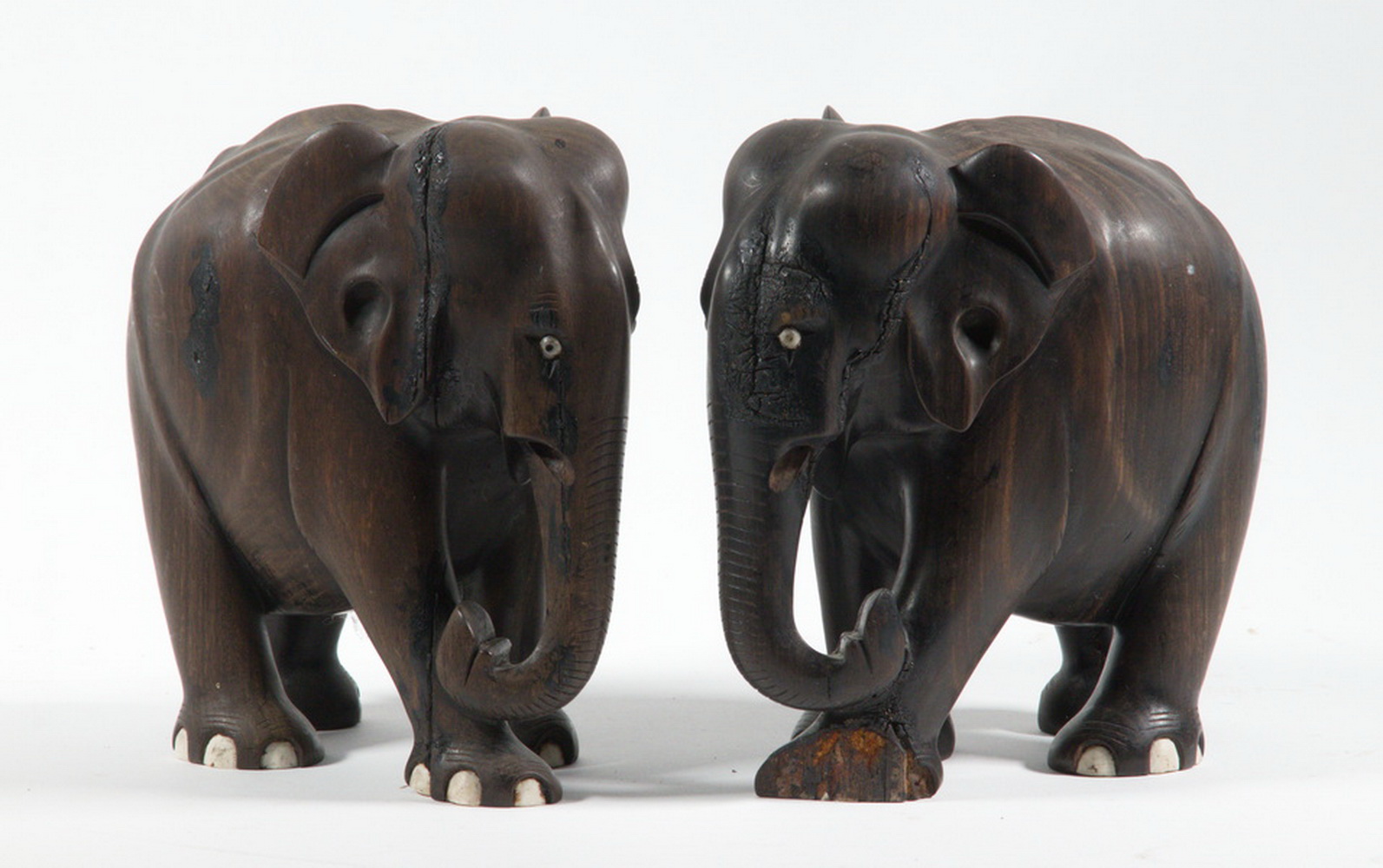 Appraisal: PR OF CARVED EBONY ELEPHANTS WITH BONE INLAY th c