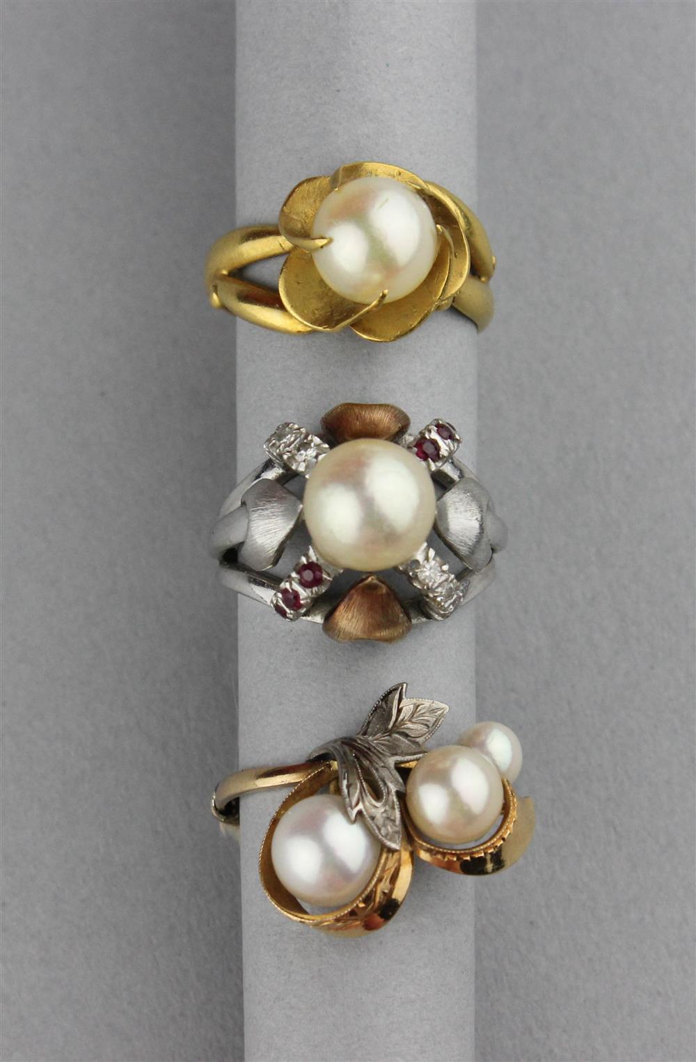 Appraisal: THREE CULTURED PEARL RINGS SET IN K YELLOW GOLD the