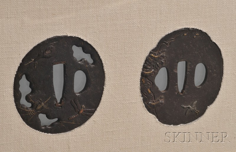 Appraisal: Two Tsuba in a Single Frame th century iron with